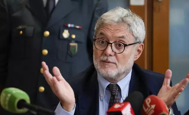 National Anti-Mafia Prosecutor Giovanni Milillo gestures as he speaks during a news conference at the Milan's court, in Milan, Italy, Monday, Sept. 30, 2024. (AP Photo/Luca Bruno)