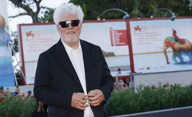 Pedro Almodovar poses for photographers upon arrival at the closing ceremony of the 81st edition of the Venice Film Festival in Venice, Italy, on Saturday, Sept. 7, 2024. (Photo by Joel C Ryan/Invision/AP)