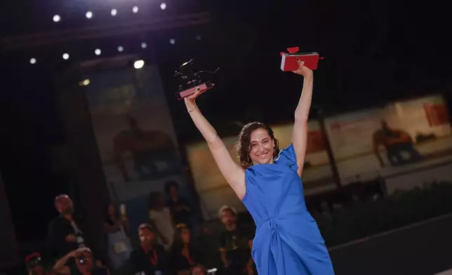 Sarah Friedland, winner of the lion of the future luigi de laurentis award for a debut film for 'Familiar Touch', poses for photographers at the awards photo call during the closing ceremony of the 81st edition of the Venice Film Festival in Venice, Italy, on Saturday, Sept. 7, 2024. (Photo by Vianney Le Caer/Invision/AP)