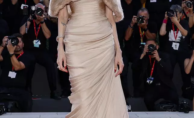 Angelina Jolie poses for photographers upon arrival for the premiere of the film 'Maria' during the 81st edition of the Venice Film Festival in Venice, Italy, on Thursday, Aug. 29, 2024. (Photo by Joel C Ryan/Invision/AP)