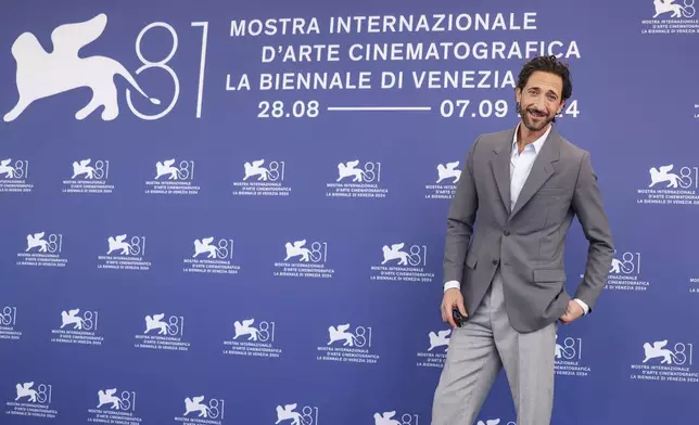 Adrien Brody poses for photographers at the photo call for the film 'The Brutalist' during the 81st edition of the Venice Film Festival in Venice, Italy, on Sunday, Sept. 1, 2024. (Photo by Vianney Le Caer/Invision/AP)