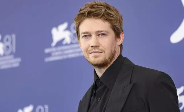 Joe Alwyn poses for photographers at the photo call for the film 'The Brutalist' during the 81st edition of the Venice Film Festival in Venice, Italy, on Sunday, Sept. 1, 2024. (Photo by Vianney Le Caer/Invision/AP)