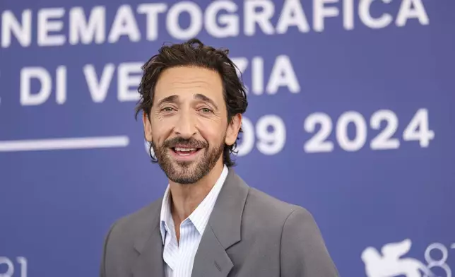 Adrien Brody poses for photographers at the photo call for the film 'The Brutalist' during the 81st edition of the Venice Film Festival in Venice, Italy, on Sunday, Sept. 1, 2024. (Photo by Vianney Le Caer/Invision/AP)