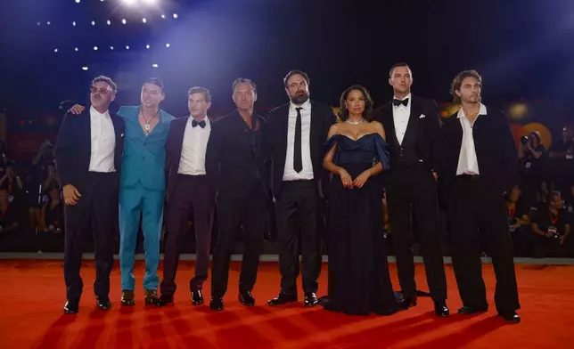 Writer Zach Baylin, from left, Phillip Forest Lewitski, Tye Sheridan, Jude Law, director Justin Kurzel, Jurnee Smollett, Nicholas Hoult and Matias Lucas pose for photographers upon arrival for the premiere of the film 'The Order' during the 81st edition of the Venice Film Festival in Venice, Italy, on Saturday, Aug. 31, 2024. (Photo by Vianney Le Caer/Invision/AP)