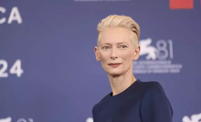 Tilda Swinton poses for photographers at the photo call for the film 'The Room Next Door' during the 81st edition of the Venice Film Festival in Venice, Italy, on Monday, Sept. 2, 2024. (Photo by Vianney Le Caer/Invision/AP)