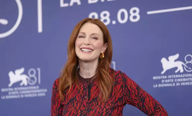 Julianne Moore poses for photographers at the photo call for the film 'The Room Next Door' during the 81st edition of the Venice Film Festival in Venice, Italy, on Monday, Sept. 2, 2024. (Photo by Vianney Le Caer/Invision/AP)