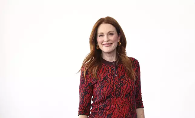 Julianne Moore poses for photographers at the photo call for the film 'The Room Next Door' during the 81st edition of the Venice Film Festival in Venice, Italy, on Monday, Sept. 2, 2024. (Photo by Vianney Le Caer/Invision/AP)