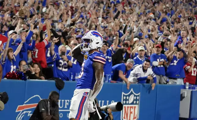 Buffalo Bills wide receiver Keon Coleman celebrates after scoring a touchdown against the Jacksonville Jaguars during the first half of an NFL football game Monday, Sept. 23, 2024, in Orchard Park, NY. (AP Photo/Steven Senne)