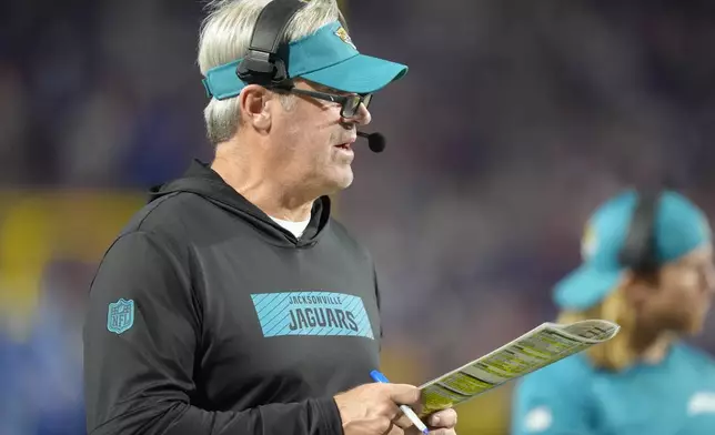 Jacksonville Jaguars head coach Doug Pederson watches from the sideline during the second half of an NFL football game against the Buffalo Bills, Monday, Sept. 23, 2024, in Orchard Park, NY. (AP Photo/Steven Senne)