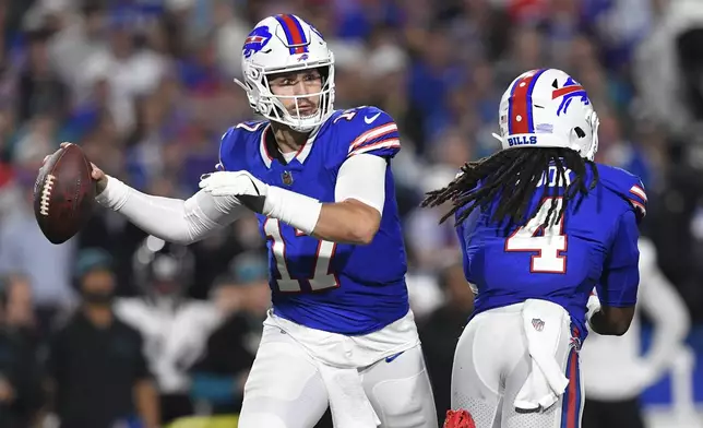 Buffalo Bills quarterback Josh Allen (17) throws a pass during the first half of an NFL football game against the Jacksonville Jaguars, Monday, Sept. 23, 2024, in Orchard Park, NY. (AP Photo/Adrian Kraus)