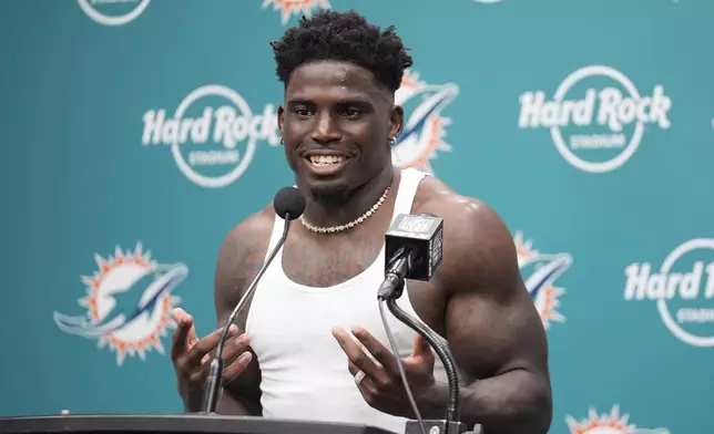 Miami Dolphins wide receiver Tyreek Hill speaks during an NFL football post game news conference, Sunday, Sept. 8, 2024, in Miami Gardens, Fla. The Dolphins defeated the Jaguars 20-17. (AP Photo/Rebecca Blackwell)