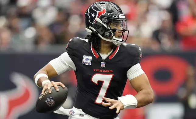 Houston Texans quarterback C.J. Stroud (7) looks to pass during the second half of an NFL football game against the Jacksonville Jaguars, Sunday, Sept. 29, 2024, in Houston. (AP Photo/Eric Gay)