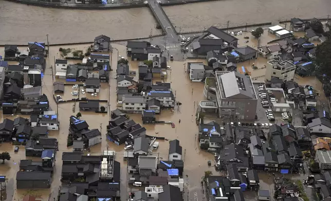 This aerial photo shows the flooded area after heavy rain in Wajima, Ishikawa prefecture, Saturday, Sept. 21, 2024. (Kyodo News via AP)