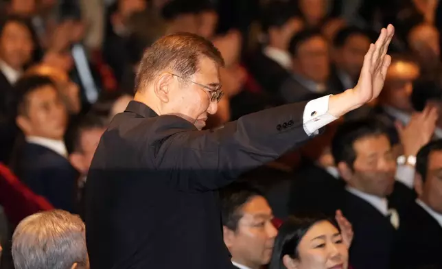 Shigeru Ishiba acknowledges after he was elected as new head of Japan's ruling party at the Liberal Democratic Party's (LDP) leadership election Friday, Sept. 27, 2024, at the party headquarters in Tokyo. (AP Photo/Hiro Komae, Pool)