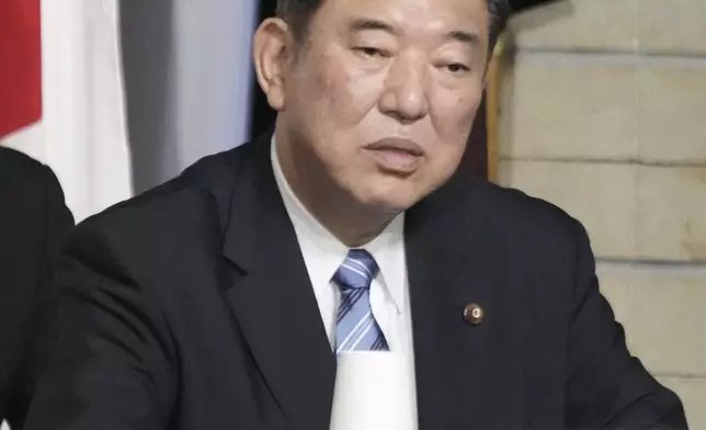 Former Defense Minister Shigeru Ishiba, a candidate for the ruling Liberal Democratic Party's presidential election, attends a joint speech session with other candidates, at the party's headquarters in Tokyo, Japan Thursday, Sept. 12, 2024.(Kyodo News via AP)