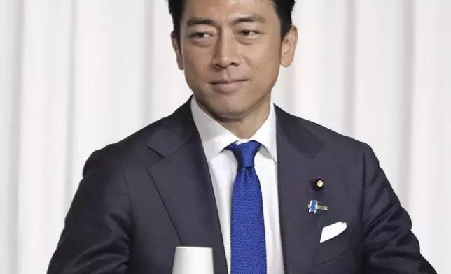 Former Environment Minister Shinjiro Koizumi, a candidate for the ruling Liberal Democratic Party's presidential election, attends a joint speech session with other candidates, at the party's headquarters in Tokyo, Japan Thursday, Sept. 12, 2024.(Kyodo News via AP)