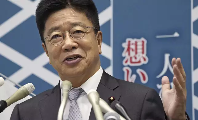 Japan's former Chief Cabinet Secretary Katsunobu Kato speaks during a press conference as he announces his candidacy of the Liberal Democratic Party's presidential election, at the parliament in Tokyo, on Sept. 10, 2024. (Kyodo News via AP)