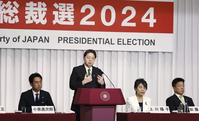 Chief Cabinet Secretary Yoshimasa Hayashi, second left, a candidate of Japan's ruling Liberal Democratic Party (LDP) presidential election, speaks during a joint news conference at the party's headquarters in Tokyo, Friday, Sept. 13, 2024. (Franck Robichon/Pool Photo via AP)