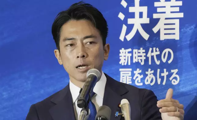 Japan's former Environment Minister Shinjiro Koizumi speaks at a news conference on running in the upcoming leadership election of the ruling Liberal Democratic Party in Tokyo, on Sept. 6, 2024. (Kyodo News via AP)