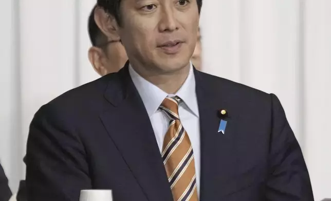 Former Economic Security Minister Takayuki Kobayashi, a candidate for the ruling Liberal Democratic Party's presidential election, attends a joint speech session with other candidates, at the party's headquarters in Tokyo, Japan Thursday, Sept. 12, 2024.(Kyodo News via AP)