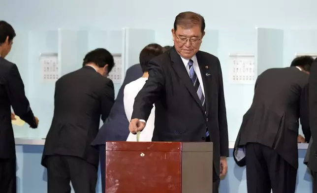 One of candidates Shigeru Ishiba casts his ballot at the ruling Liberal Democratic Party's (LDP) leadership election Friday, Sept. 27, 2024, in Tokyo. (AP Photo/Hiro Komae, Pool)