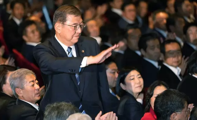 Shigeru Ishiba acknowledges after he was elected as new head of Japan's ruling Liberal Democratic Party (LDP) during the party's leadership election Friday, Sept. 27, 2024, in Tokyo. (AP Photo/Hiro Komae, Pool)