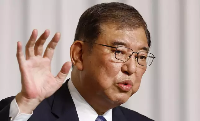Shigeru Ishiba, the newly elected leader of Japan's ruling party, the Liberal Democratic Party (LDP) holds a press conference after the LDP leadership election, in Tokyo Friday, Sept. 27, 2024. (Kim Kyung-Hoon/Pool Photo via AP)