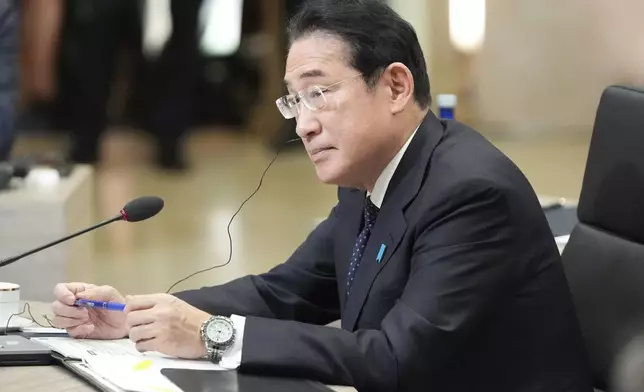 FILE - Japan's Prime Minister Fumio Kishida listens at the Quad leaders summit at Archmere Academy in Claymont, Del., Saturday, Sept. 21, 2024. (AP Photo/Mark Schiefelbein, File)