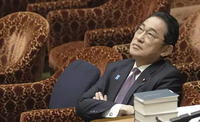 FILE - Japan's Prime Minister Fumio Kishida waits for the start of a budget committee's meeting in Tokyo on March 1, 2024, where two former cabinet ministers belonging to Japan's governing party's key faction behind a major corruption scandal that has rocked the government renewed denial they had any role in running slush funds. (Kyodo News via AP, File)