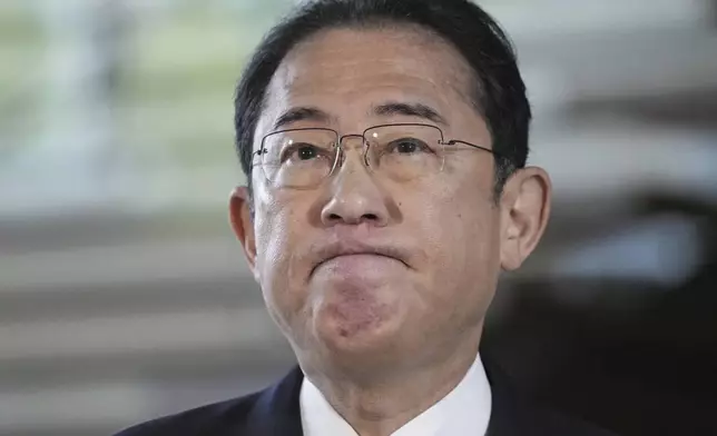 FILE - Japan's Prime Minister Fumio Kishida speaks to reporters at his office in Tokyo, on April 30, 2024 as he acknowledged that his governing party's major defeat in the weekend's by-elections was due to a slush fund scandal. (Kyodo News via AP, File)