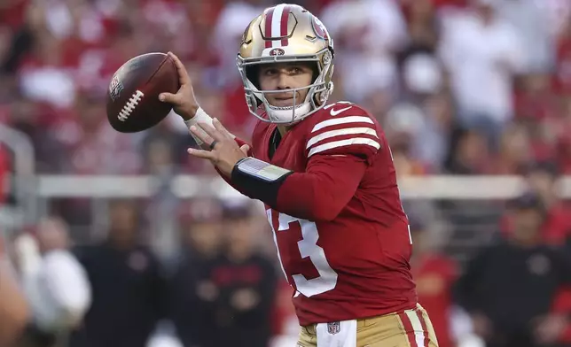 San Francisco 49ers quarterback Brock Purdy looks to pass the ball against the New York Jets during the first half of an NFL football game in Santa Clara, Calif., Monday, Sept. 9, 2024. (AP Photo/Jed Jacobsohn)