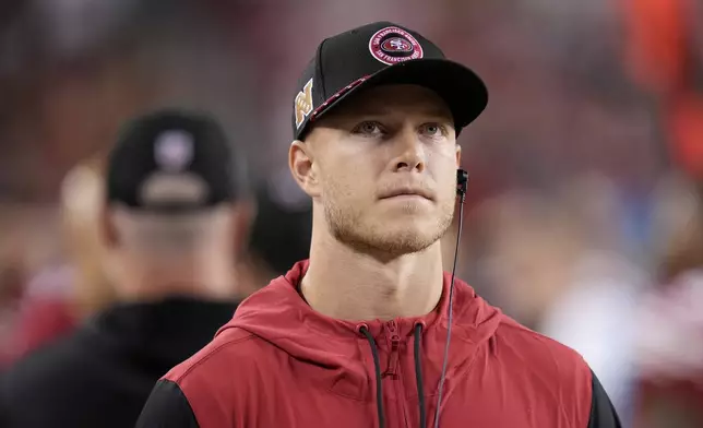 San Francisco 49ers running back Christian McCaffrey walks on the sideline during the second half of an NFL football game against the New York Jets in Santa Clara, Calif., Monday, Sept. 9, 2024. (AP Photo/Godofredo A. Vásquez)