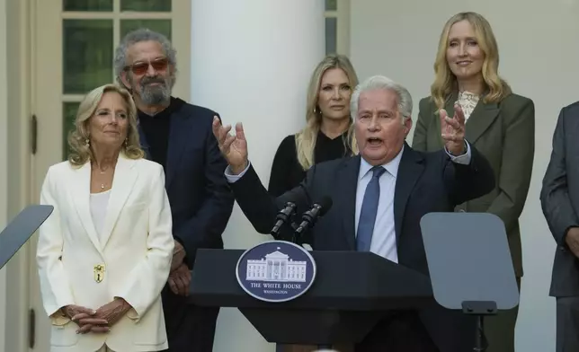 First lady Jill Biden, listens to actor Martin Sheen speaks at an event on the Rose Garden at the White House to mark the 25th anniversary of the television series, The West Wing, Friday, Sept. 20, 2024, in Washington. (AP Photo/Manuel Balce Ceneta)