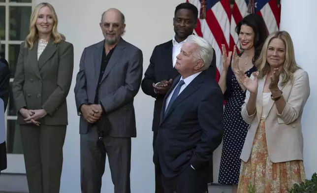 Actor Martin Sheen and other members of the cast of The West Wing, listen to Aaron Sorkin speak at an event on the Rose Garden at the White House to mark the 25th anniversary of the television series, The West Wing, Friday, Sept. 20, 2024, in Washington. (AP Photo/Manuel Balce Ceneta)