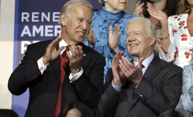 FILE - Sen. Joe Biden and former President Jimmy Carter are seen at the Democratic National Convention in Denver, Aug. 26, 2008. (AP Photo/Paul Sancya, File)