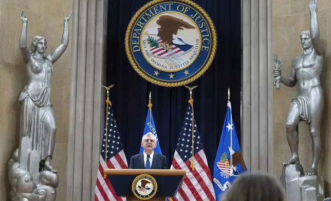 Attorney General Merrick Garland speaks to the U.S. Attorneys who have gathered for their annual conference at the Department of Justice headquarters in Washington, Thursday, Sept. 12, 2024. (AP Photo/Jose Luis Magana)