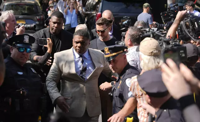 Justin Timberlake, center, walks into court for a hearing, Friday, Sept. 13, 2024, in Sag Harbor, N.Y. (AP Photo/Pamela Smith)