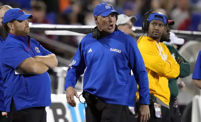 Kansas head coach Lance Leipold yells at an official during the second half of an NCAA college football game against Illinois on Saturday, Sept. 7, 2024, in Champaign, Ill. (AP Photo/Charles Rex Arbogast)