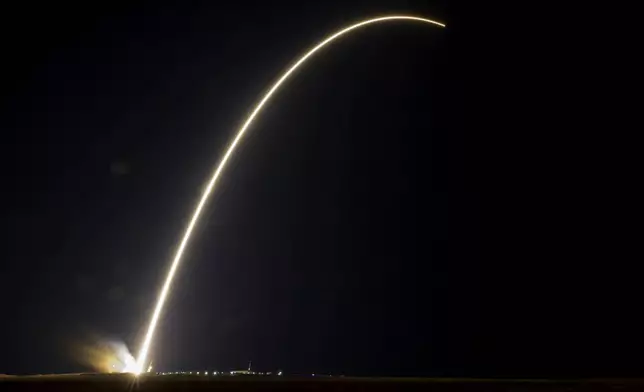 In this image provided by NASA, a Soyuz rocket carrying Roscosmos cosmonauts Alexey Ovchinin, Ivan Vagner and NASA astronaut Don Pettit, a new crew to the International Space Station (ISS), blasts off from the Russian leased Baikonur cosmodrome in Kazakhstan, Wednesday, Sept. 11, 2024. (Bill Ingalls/NASA via AP)