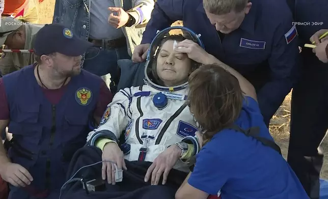 In this photo taken from video released by Roscosmos space corporation, Roscosmos cosmonaut Oleg Kononenko sits in a chair shortly after the landing of the Russian Soyuz MS-25 space capsule carrying NASA astronaut Tracy Dyson, Roscosmos cosmonauts Oleg Kononenko and Nikolai Chub, south-east of the Kazakh town of Zhezkazgan, Kazakhstan, Monday, Sept. 23, 2024. (Roscosmos space corporation via AP)