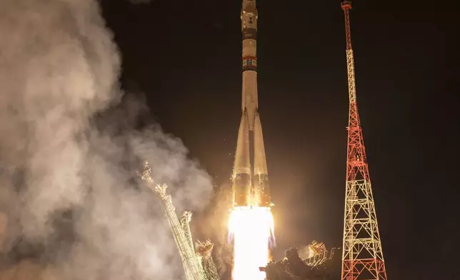 In this image provided by NASA, a Soyuz rocket carrying Roscosmos cosmonauts Alexey Ovchinin, Ivan Vagner and NASA astronaut Don Pettit, a new crew to the International Space Station (ISS), blasts off from the Russian leased Baikonur cosmodrome in Kazakhstan, Wednesday, Sept. 11, 2024. (Bill Ingalls/NASA via AP)