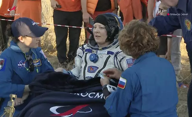 In this photo taken from video released by Roscosmos space corporation, NASA astronaut Tracy Dyson sits in a chair shortly after the landing of the Russian Soyuz MS-25 space capsule carrying NASA astronaut Tracy Dyson, Roscosmos cosmonauts Oleg Kononenko and Nikolai Chub, south-east of the Kazakh town of Zhezkazgan, Kazakhstan, Monday, Sept. 23, 2024. (Roscosmos space corporation via AP)