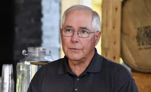 Eddie Russell, master distiller, and son of 89-year-old Jimmy Russell, the "Buddha of Bourbon" talks about having three generations of the Russell family involved in the bourbon industry at the Wild Turkey Distillery in Lawrenceburg, Ky., Wednesday, Aug. 28, 2024. (AP Photo/Timothy D. Easley)