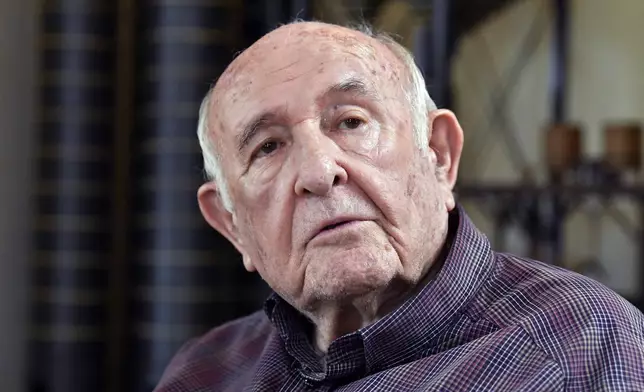 Jimmy Russell, known as the "Buddha of Bourbon" talks about being the third generation of the Russell family involved in the bourbon industry at the Wild Turkey Distillery in Lawrenceburg, Ky., Wednesday, Aug. 28, 2024. (AP Photo/Timothy D. Easley)