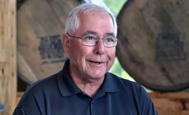 Eddie Russell, master distiller, and son of 89-year-old Jimmy Russell, the "Buddha of Bourbon" talks about having three generations of the Russell family involved in the bourbon industry at the Wild Turkey Distillery in Lawrenceburg, Ky., Wednesday, Aug. 28, 2024. (AP Photo/Timothy D. Easley)