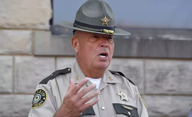 Laurel County Sheriff John Root addresses the media to give an update on the efforts to find the suspect in the shooting at I-75 at the Livingston Ky. exit at the Laurel County Sheriff's Office in London, Ky., Monday, Sept. 9, 2024. (AP Photo/Timothy D. Easley)