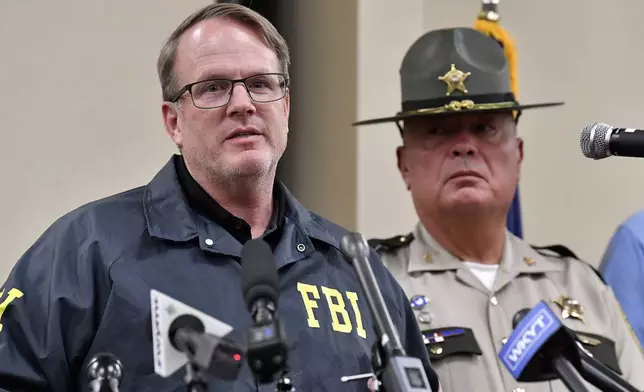 FBI Special Agent in Charge Michael Stansbury gives an update at the London Community Center in London, Ky., Sunday, Sept. 8, 2024, on the efforts to find the suspect in the Saturday shooting at Interstate 75 near Livingston, Ky. (AP Photo/Timothy D. Easley)