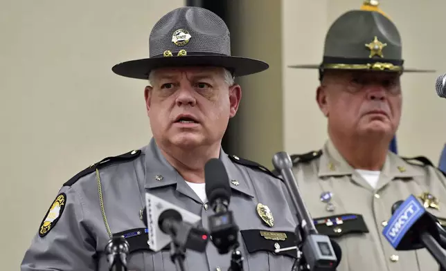 Kentucky State Police Major Eric Walker gives an update at the London Community Center in London, Ky., Sunday, Sept. 8, 2024, on the efforts to find the suspect in the Saturday shooting at Interstate 75 near Livingston, Ky. (AP Photo/Timothy D. Easley)