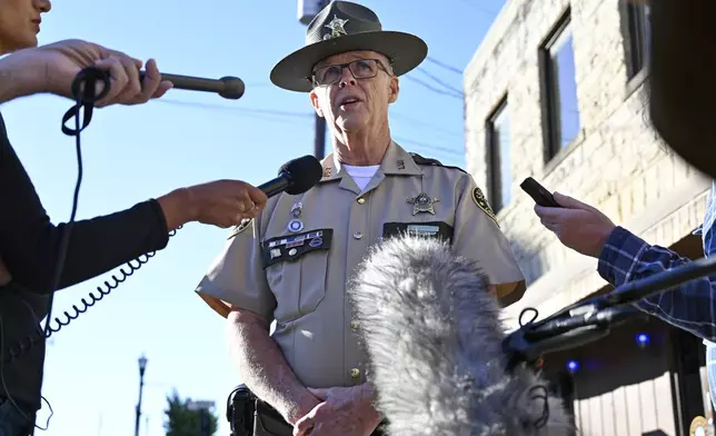 Deputy Gilbert Acciardo, Public information Officer with the Laurel County Sheriff's Office, gives details on the progress of the investigation of the shooting along I-75 in London, Ky., Sunday, Sept. 8, 2024. (AP Photo/Timothy D. Easley)