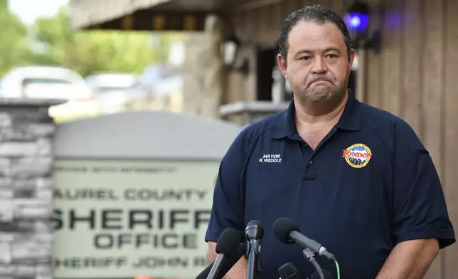 London, Ky. Mayor Randall Weddle makes comments to the media regarding the shooting that happened near his town along I-75 in London, Ky., Sunday, Sept. 8, 2024. (AP Photo/Timothy D. Easley)